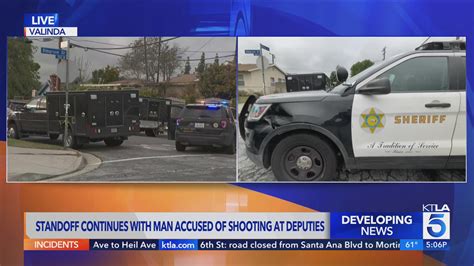 Nearly daylong standoff with man accused of shooting at deputies in San Gabriel Valley continues
